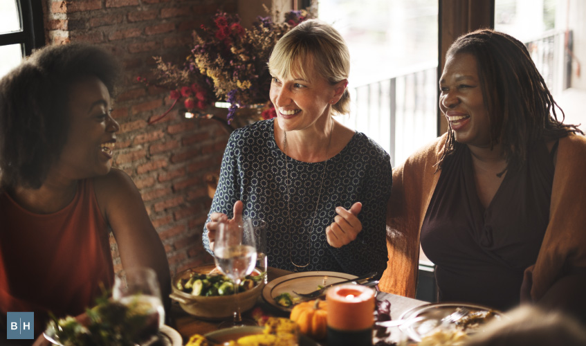 three ladies enjoying a holiday dinner